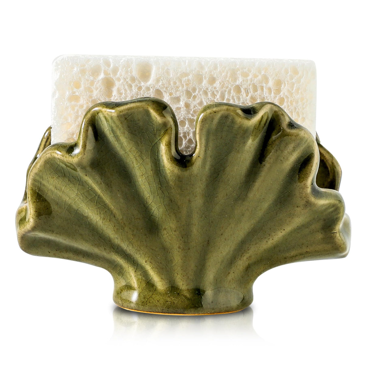 Uiddo ceramic sponge holder on kitchen sink keeps sponges dry and ready.