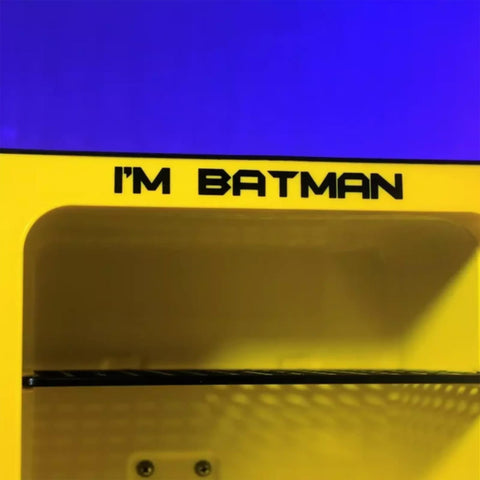 Ukonic Batman logo cooler in a dorm room for study breaks.