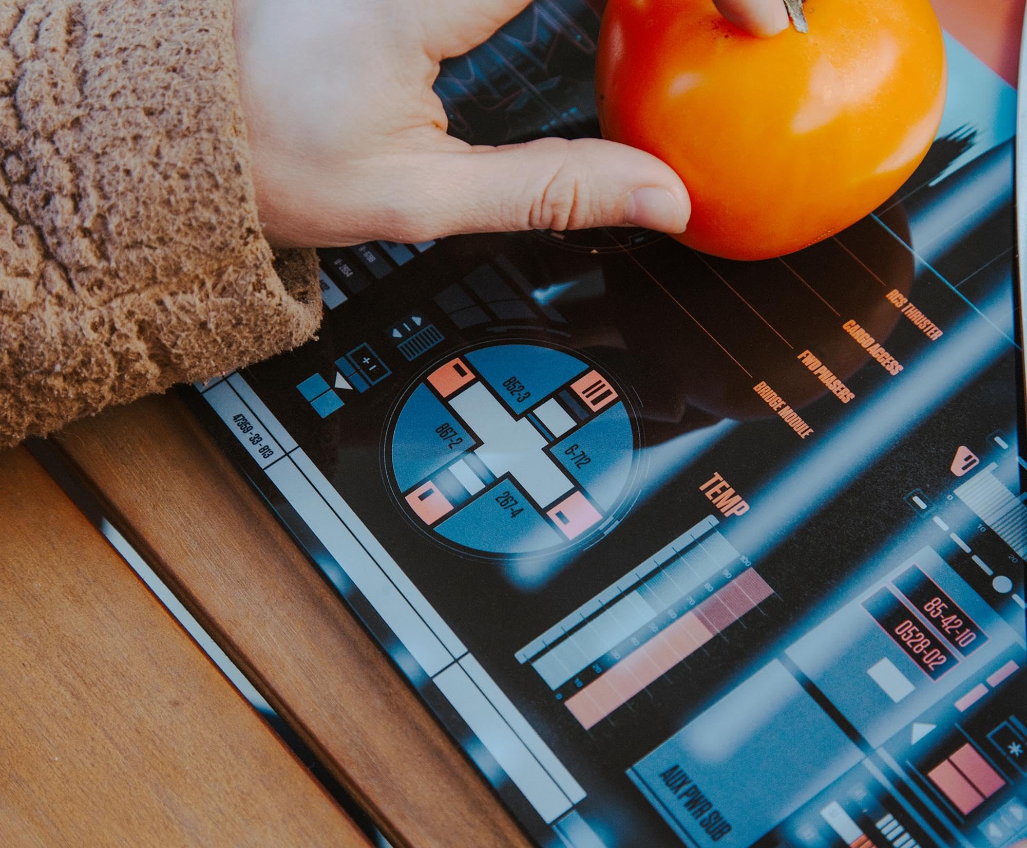 Ukonic LCARS glass cutting board features tempered surface for durability.