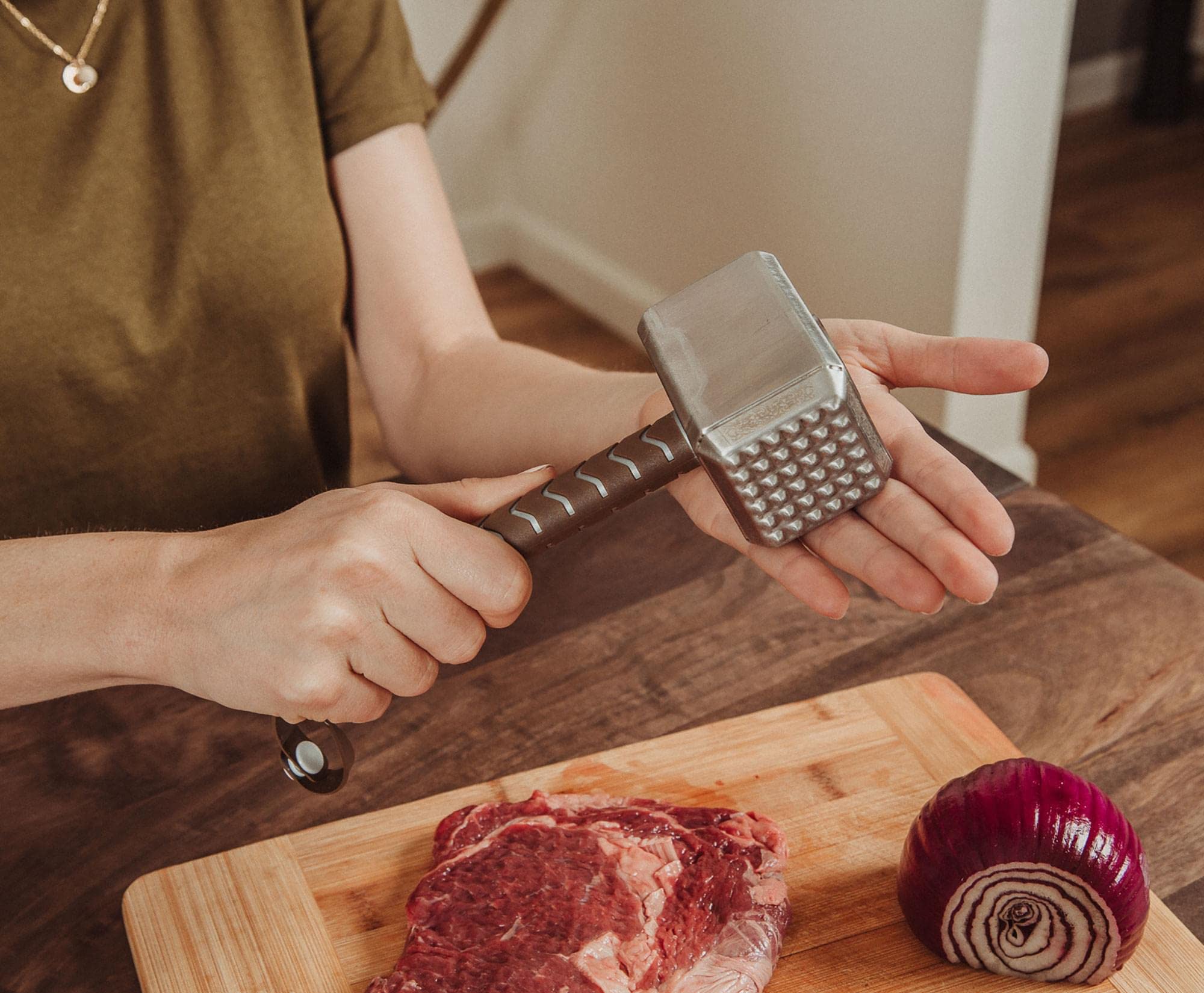 Ukonic Thor Mjolnir ergonomic handle with strap offers easy hanging and quick access beside the grill.