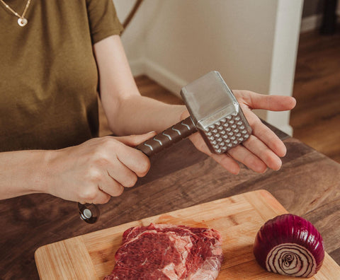 Ukonic Thor Mjolnir ergonomic handle with strap offers easy hanging and quick access beside the grill.