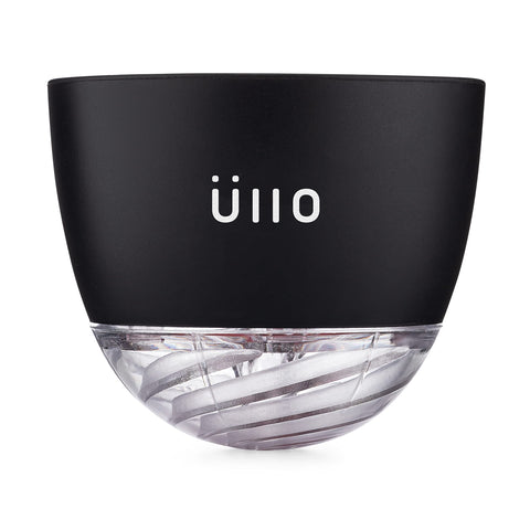 Üllo wine purifier on glass shows easy purification for cleaner tasting wine