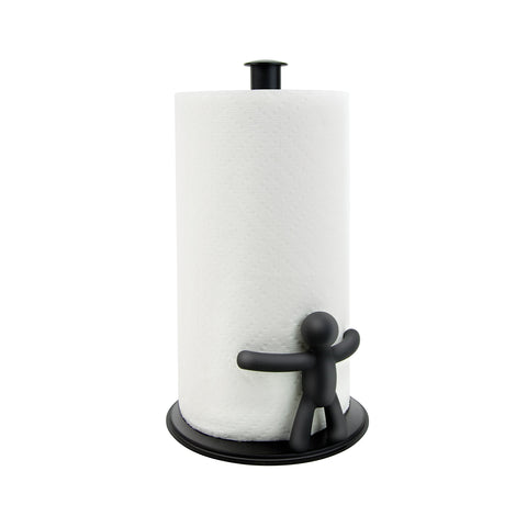 Umbra Buddy black countertop paper towel holder on a kitchen counter for one-handed tearing