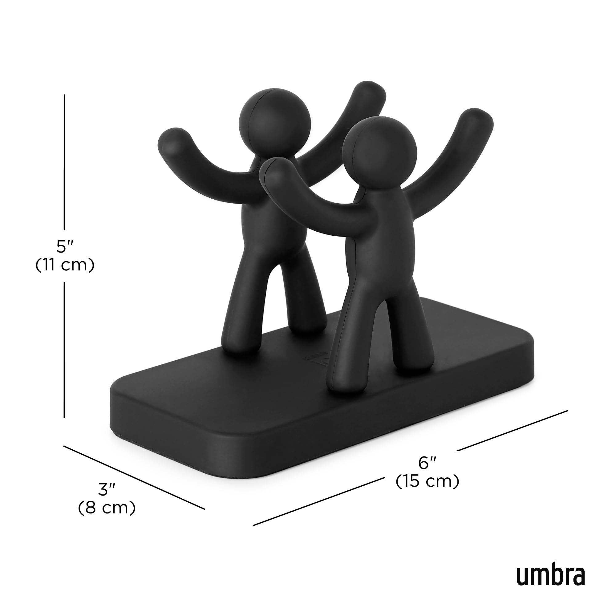 Front view of Umbra Buddy napkin holder adds decor and organization.