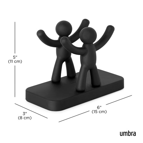 Front view of Umbra Buddy napkin holder adds decor and organization.