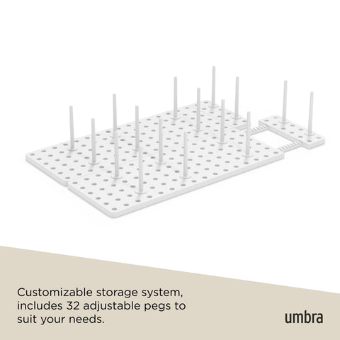 Umbra Peggy includes 32 pegs for flexible spacing and custom compartments