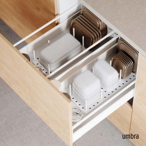 Umbra Peggy inside cupboard setup illustrates versatile organization for containers and lids