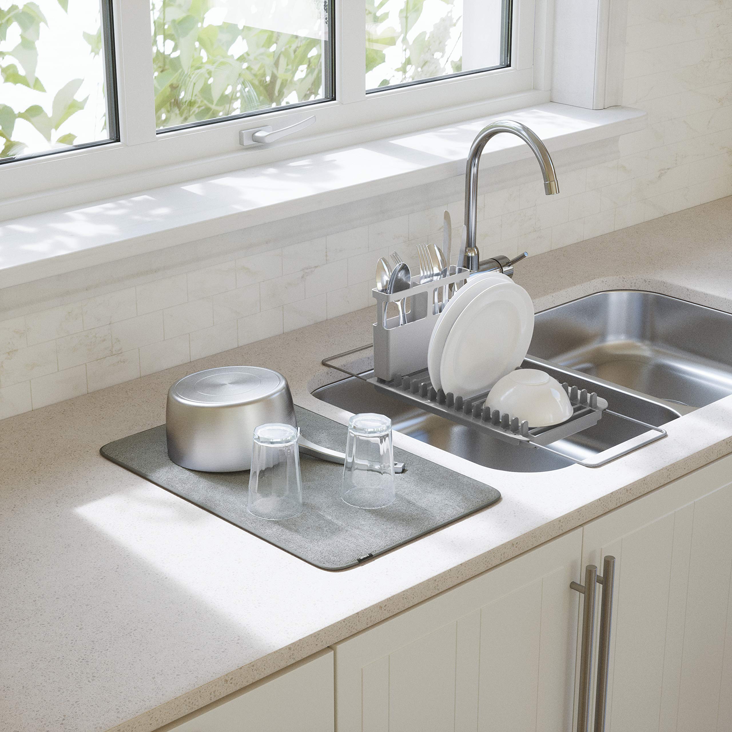 Umbra UDry drying mat absorbs water and protects countertops during daily dish drying.