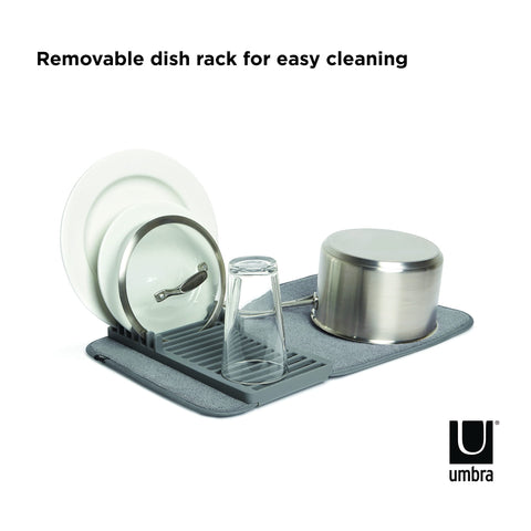Umbra Udry Mini folded storage demonstrates compact storage and counter-free feel.