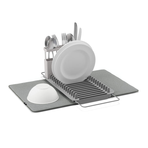 Umbra UDry over-the-sink dish rack with 16-plate capacity for organized drying.