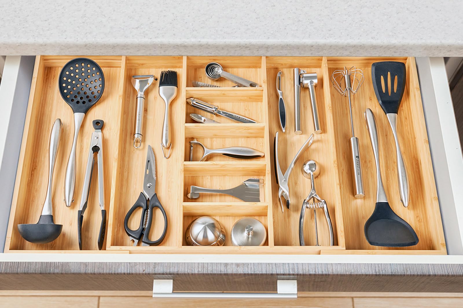 Umilife versatile storage solution for kitchen, bathroom, or office drawers.