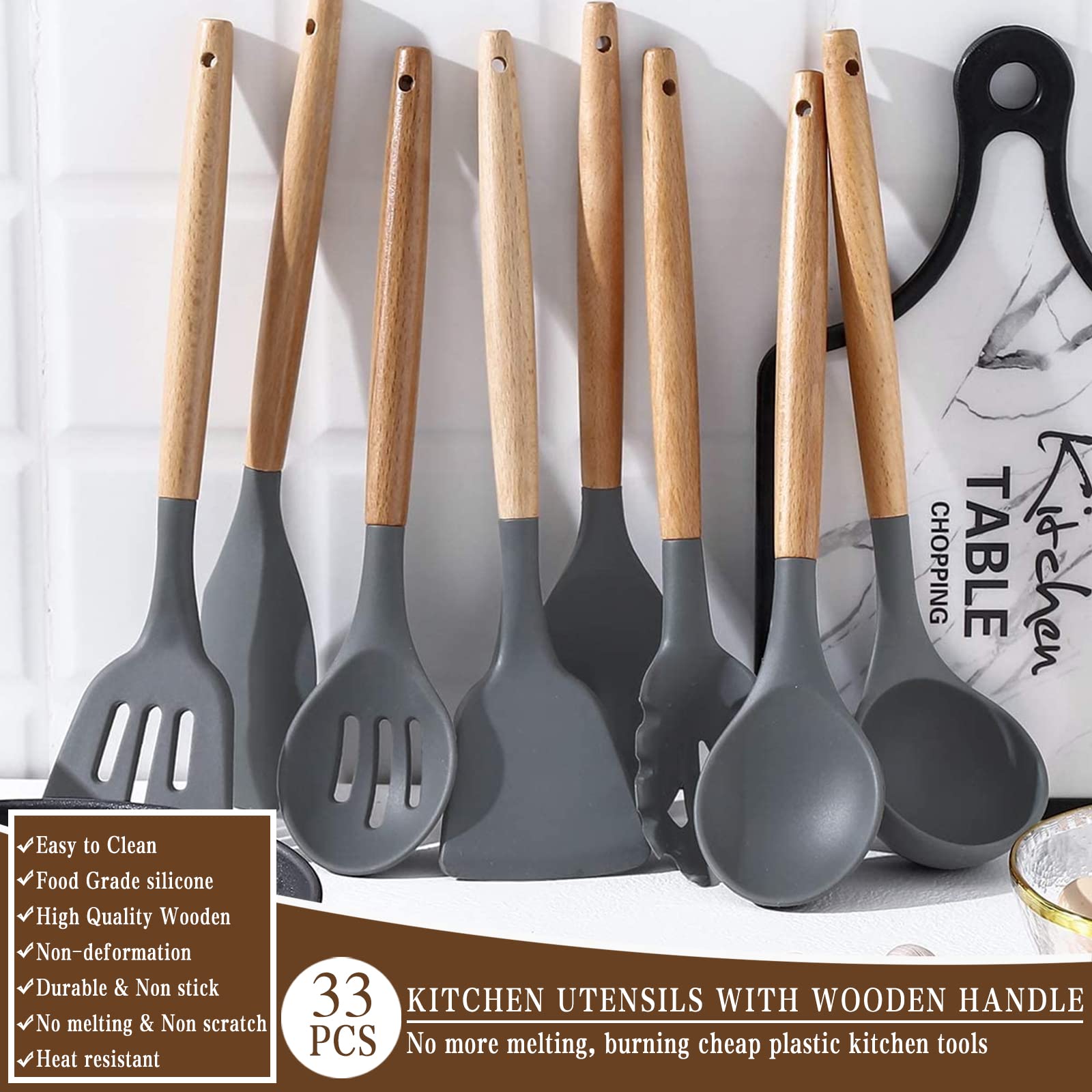 Umite Chef kitchen tongs gripping hot food safely with heat-resistant silicone tips.