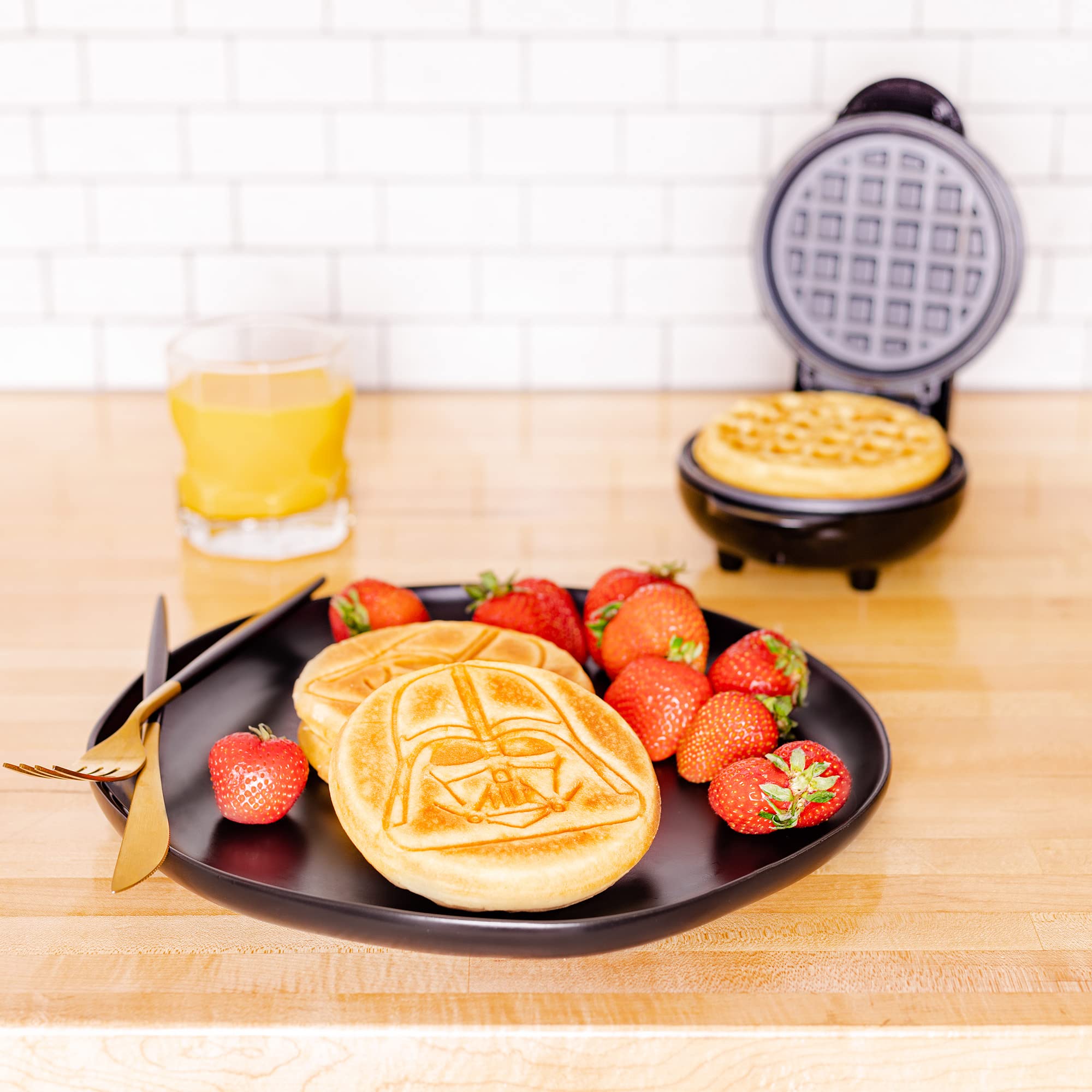 Uncanny Brands Darth Vader mini waffle maker produces 4-inch Vader waffles.