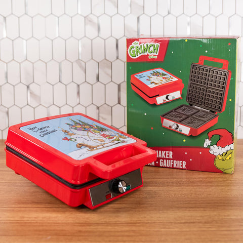 Grinch Deluxe Waffler enables hash browns, eggs, or brownies in one session.