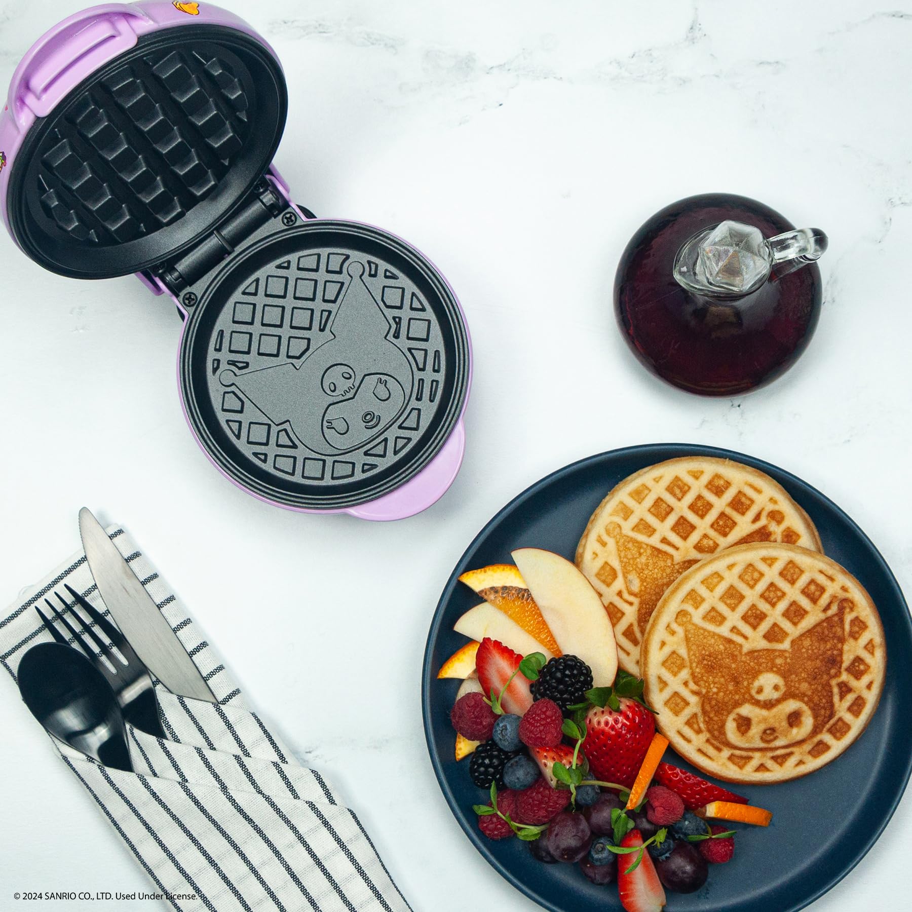 Hello Kitty Kuromi waffle maker with non-stick plates for easy cleanup.