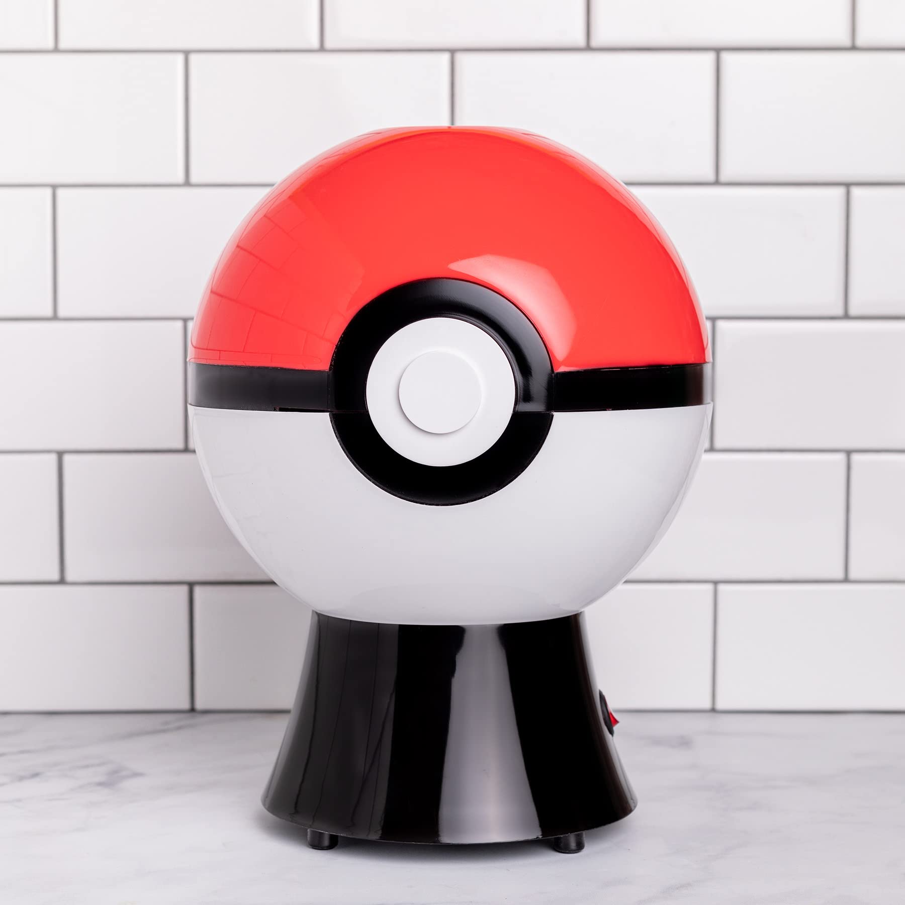 Uncanny Brands Poké Ball Popcorn Maker delivers fast oil-free popcorn for movie nights