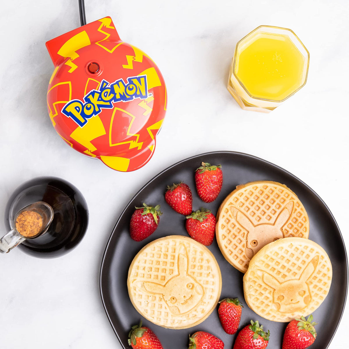 Uncanny Brands' Pokémon Pikachu mini waffle maker lid artwork adds playful kitchen charm