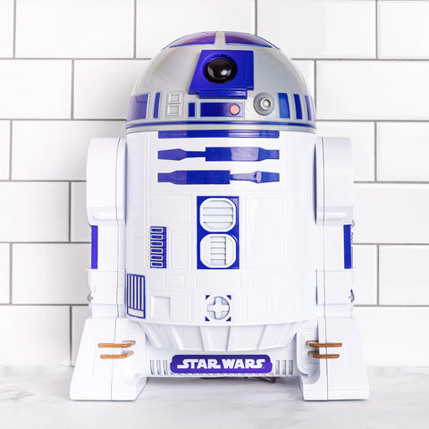 Uncanny Brands R2D2 popcorn maker detachable lid serving as a bowl for parties