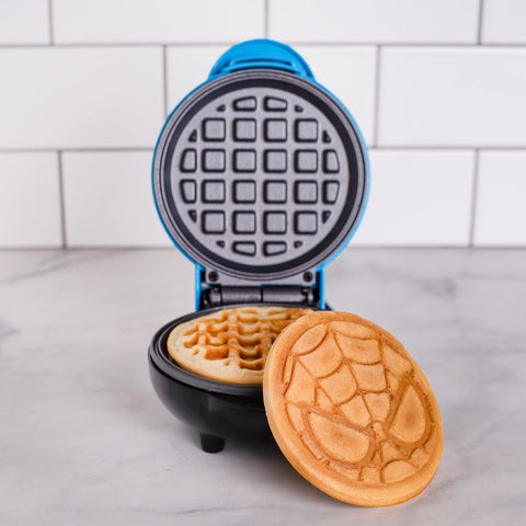 Uncanny Brands Spider-Man mini waffle maker 120V compatibility for US, Canada, Mexico.