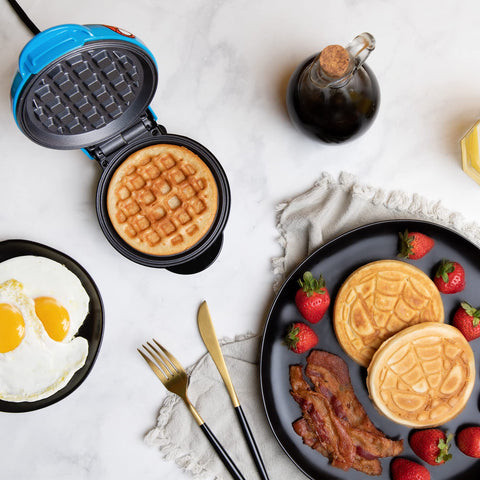 Uncanny Brands Spider-Man mini waffle maker officially licensed Marvel product with authentic design.