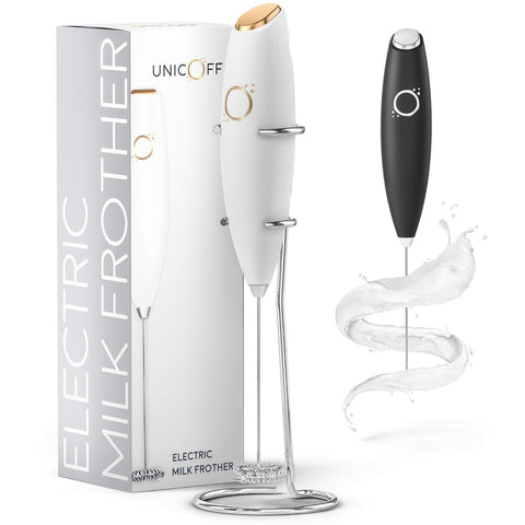 Unicoff milk frother in white and gold foams milk for lattes.