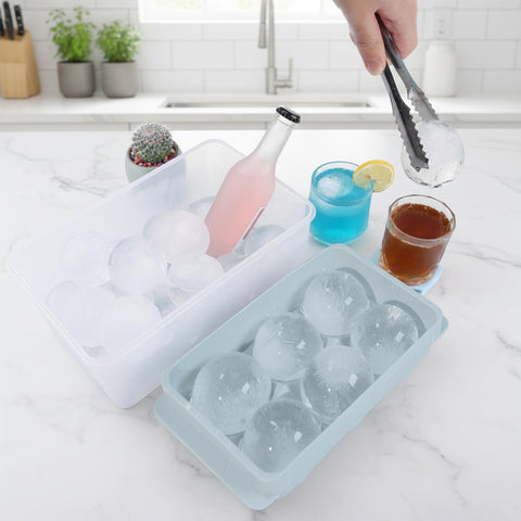 Unigul sphere mold with container and tongs for simple storage and serving.