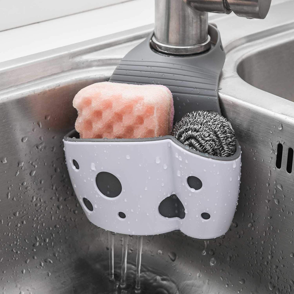 UNIKON sink caddy sponges hanging from faucet for easy reach