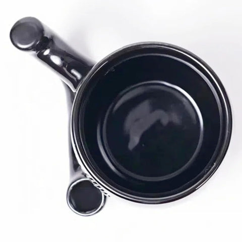 Unkzyzn Wake and Bake mug includes a filter for coffee or tea.