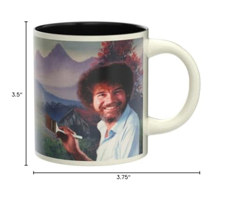 Desk-friendly Bob Ross mug offers a whimsical moment during work.