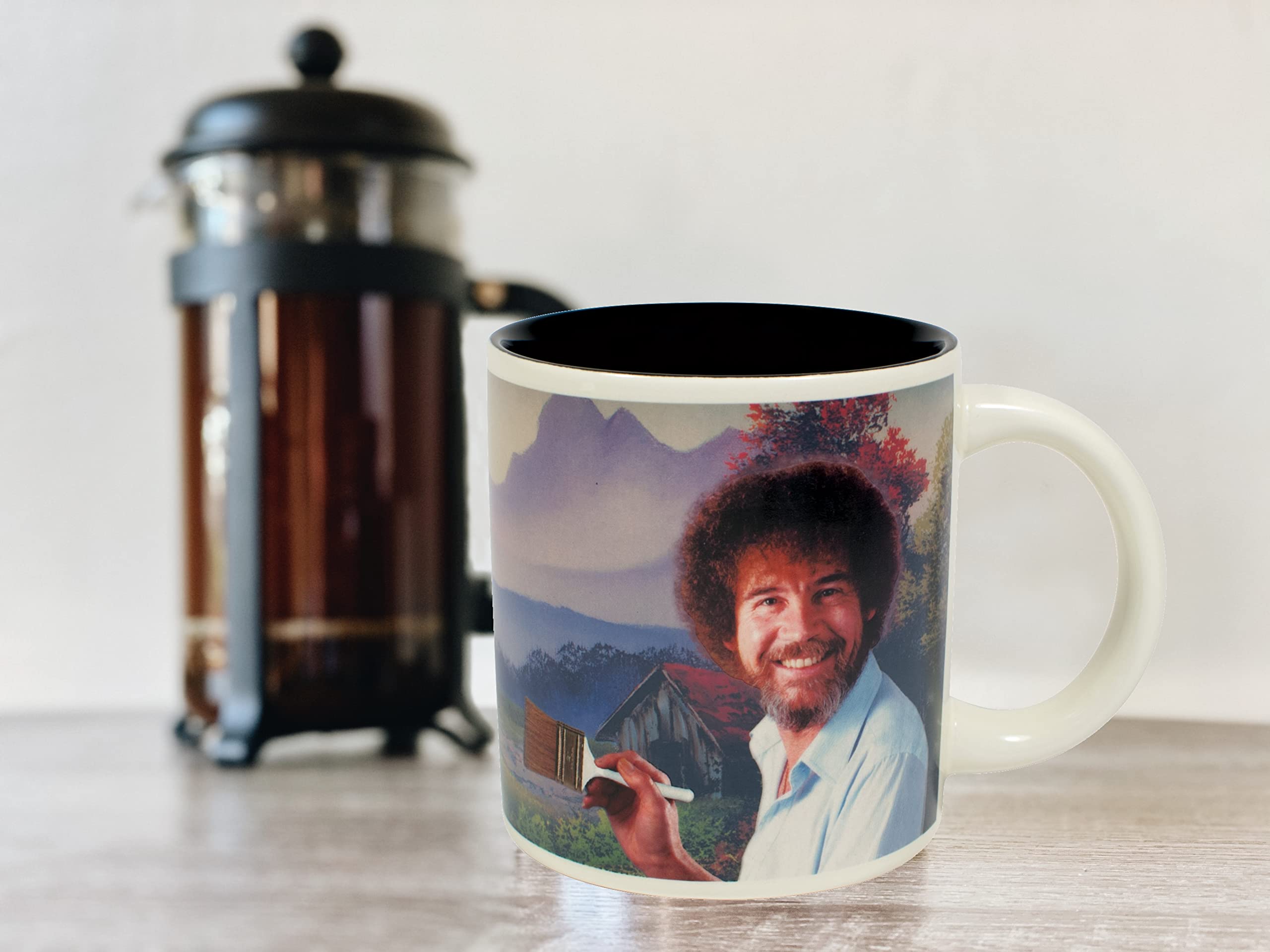 Officially licensed Bob Ross mug with color-changing reveal for daily delight.