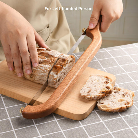 Uprichya crusty bread slicing action glides with control.