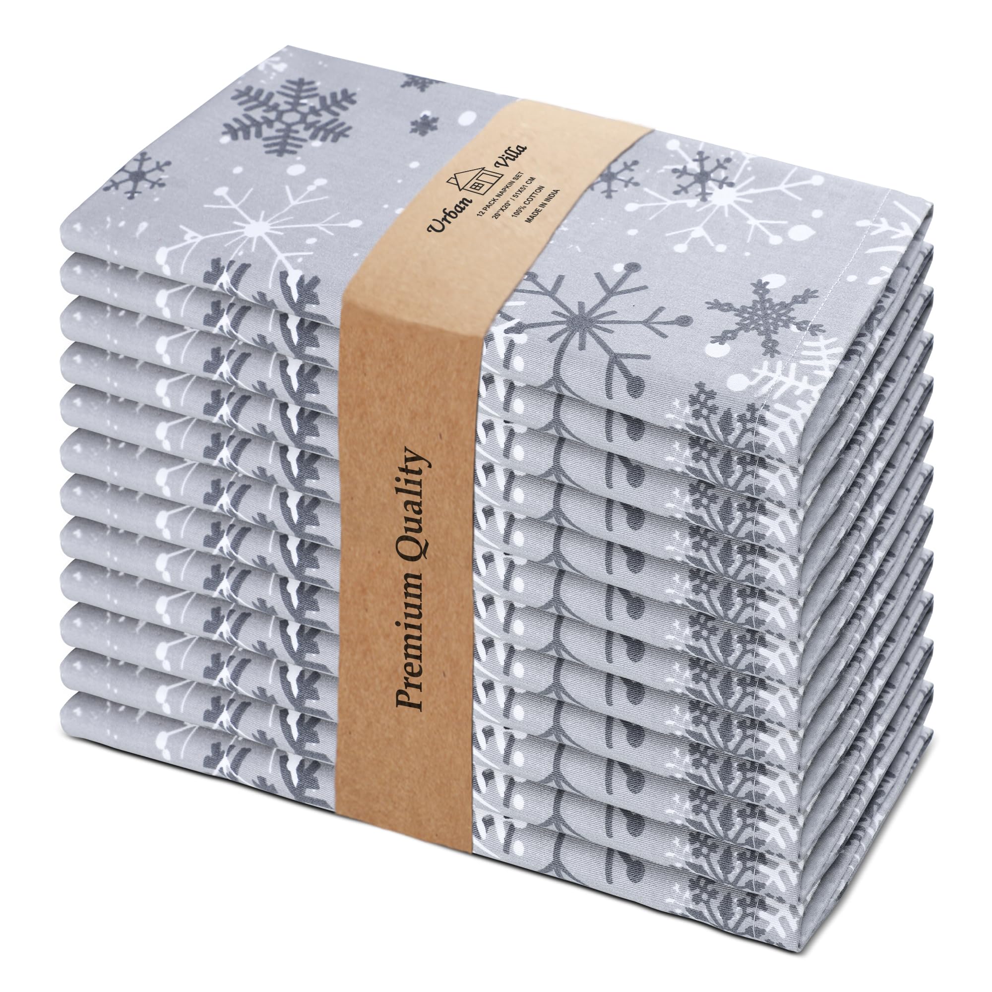 Urban Villa grey snowflake napkins folded on a festive table for elegant decor