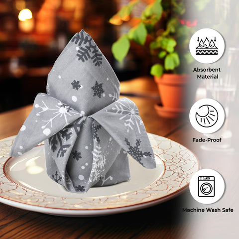 Urban Villa grey snowflake cloth napkins on a formal table setting