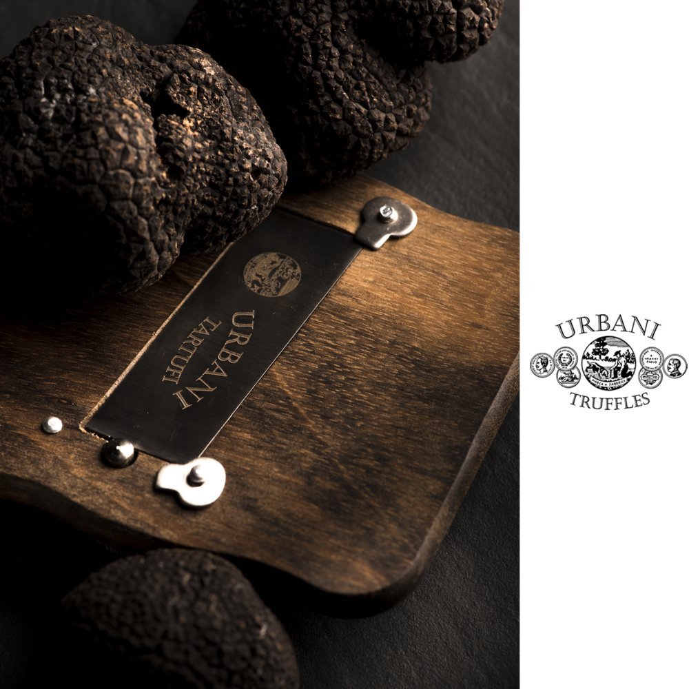 Urbani Truffles wooden slicer adds chocolate shavings for desserts.