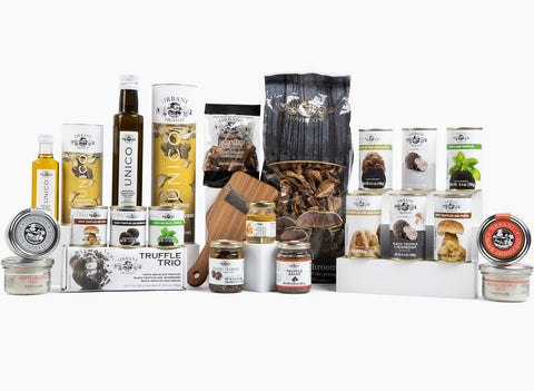 Urbani Truffles wooden slicer enhances gourmet presentation on plates.