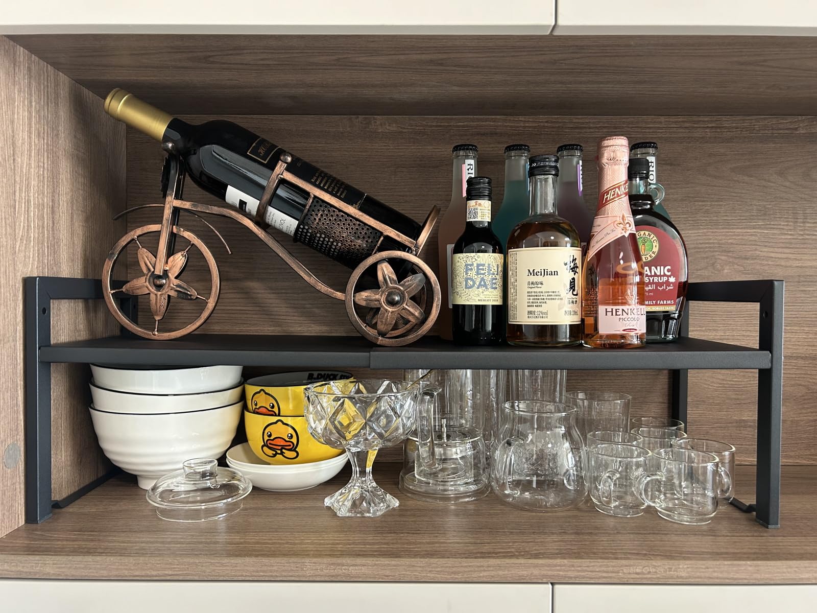 Urhomey plus expandable shelf on kitchen countertop keeps utensils organized and within reach.