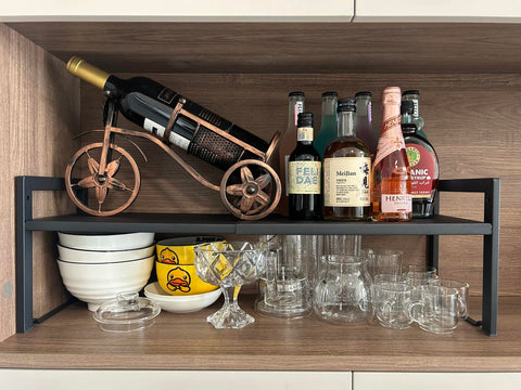 Urhomey plus expandable shelf on kitchen countertop keeps utensils organized and within reach.