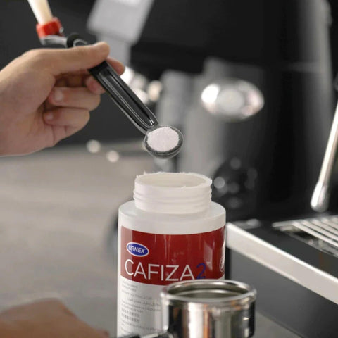 Urnex Cafiza daily backflush cleaning as part of routine care