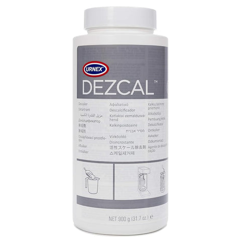 Urnex Dezcal bottle with descaler powder for fast lime buildup removal.