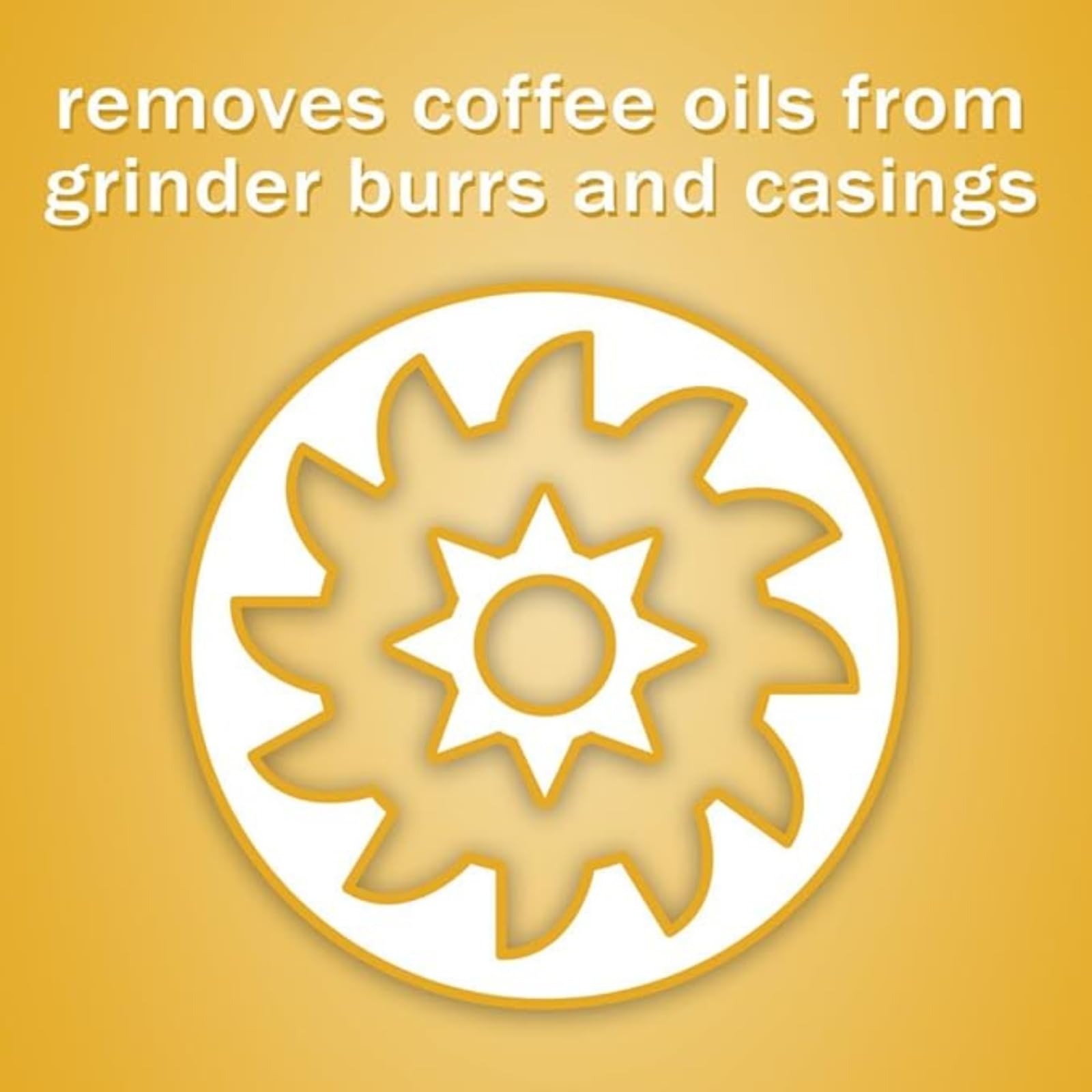 Urnex Grindz tablets in use cleaning a standard coffee grinder.