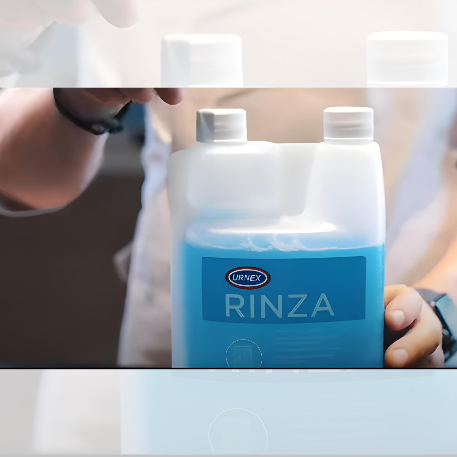 Urnex Rinza rinse cycle leaves frother chamber clean.