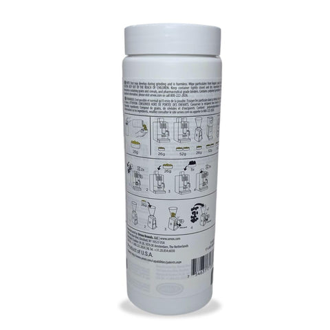 Urnex SuperGrindz bottle pour showing convenient dosing and oil absorption.