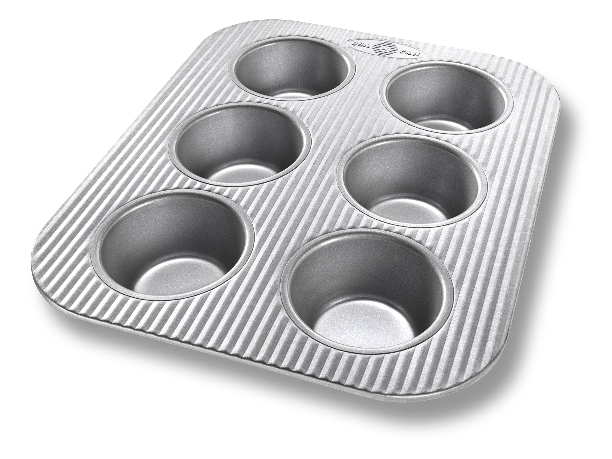 USA Pan 6-cup muffin pan in aluminized steel delivering even heat for consistent muffins.