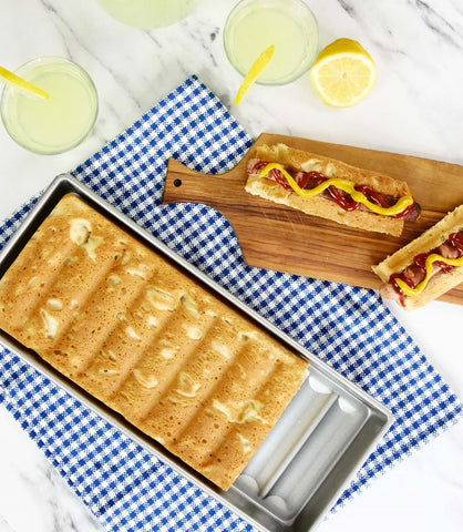 USA Pan aluminized steel bakeware highlights durable construction and quick heat distribution.