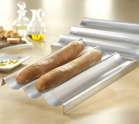 USA Pan baguette pan nonstick coating enables easy release and simple cleanup after baking.