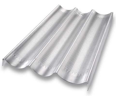 USA Pan baguette pan perforated bottom highlights even heat and easy release for crisp baguette crust.