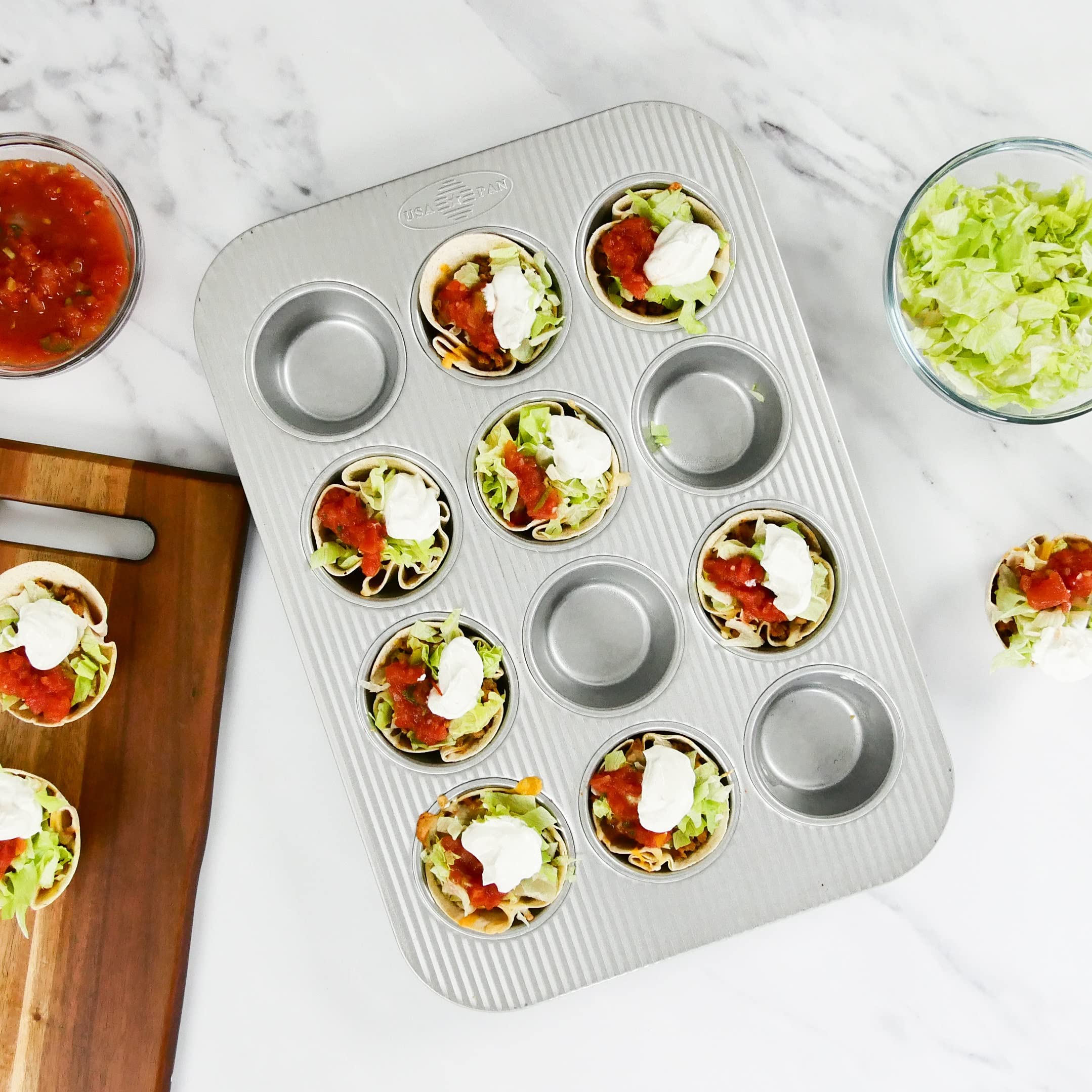 USA Pan muffin pan in oven-ready setup demonstrates even heat distribution