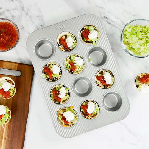 USA Pan muffin pan in oven-ready setup demonstrates even heat distribution