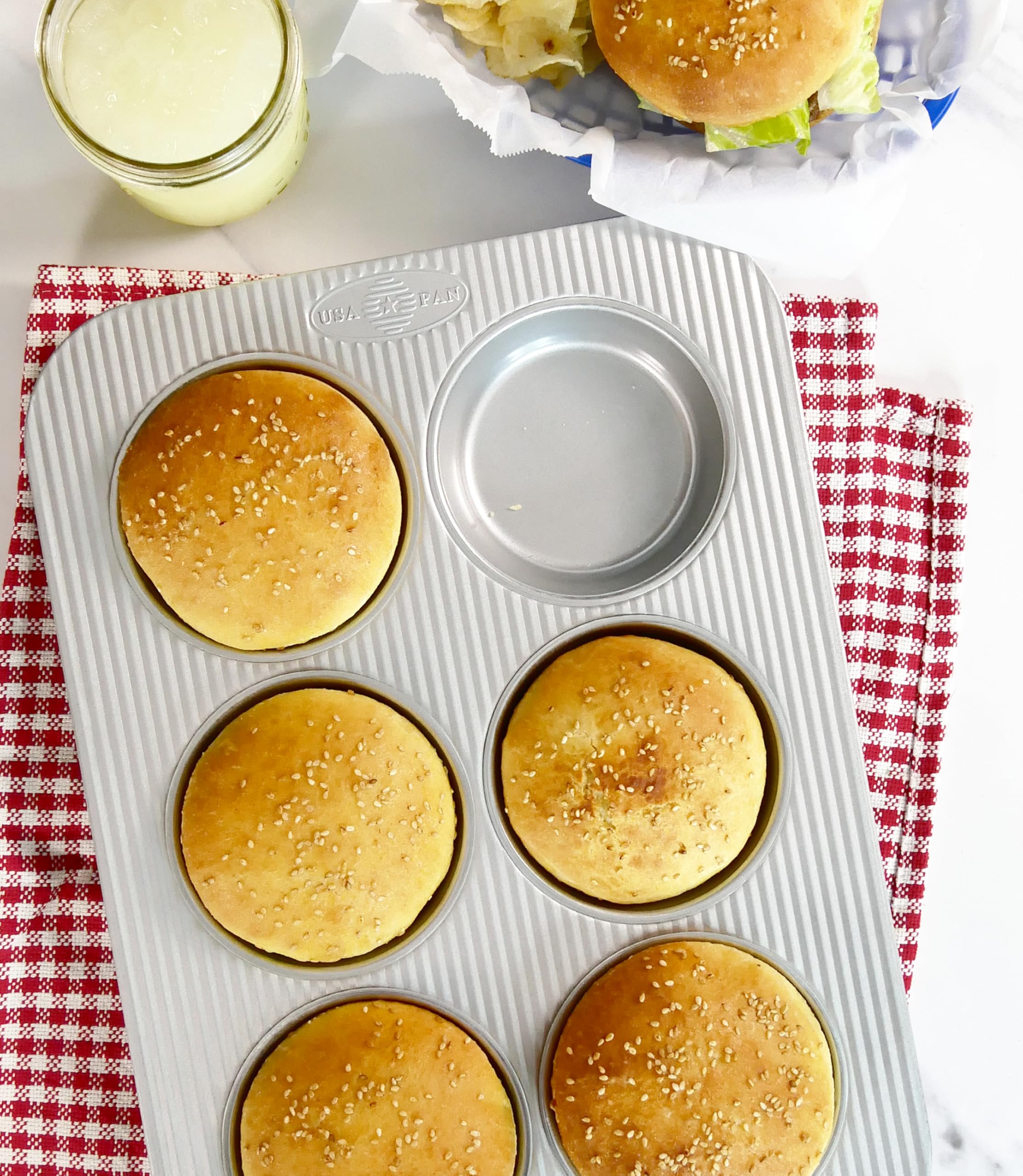 USA Pan mini round cake pan side view emphasizing sturdy construction for even baking