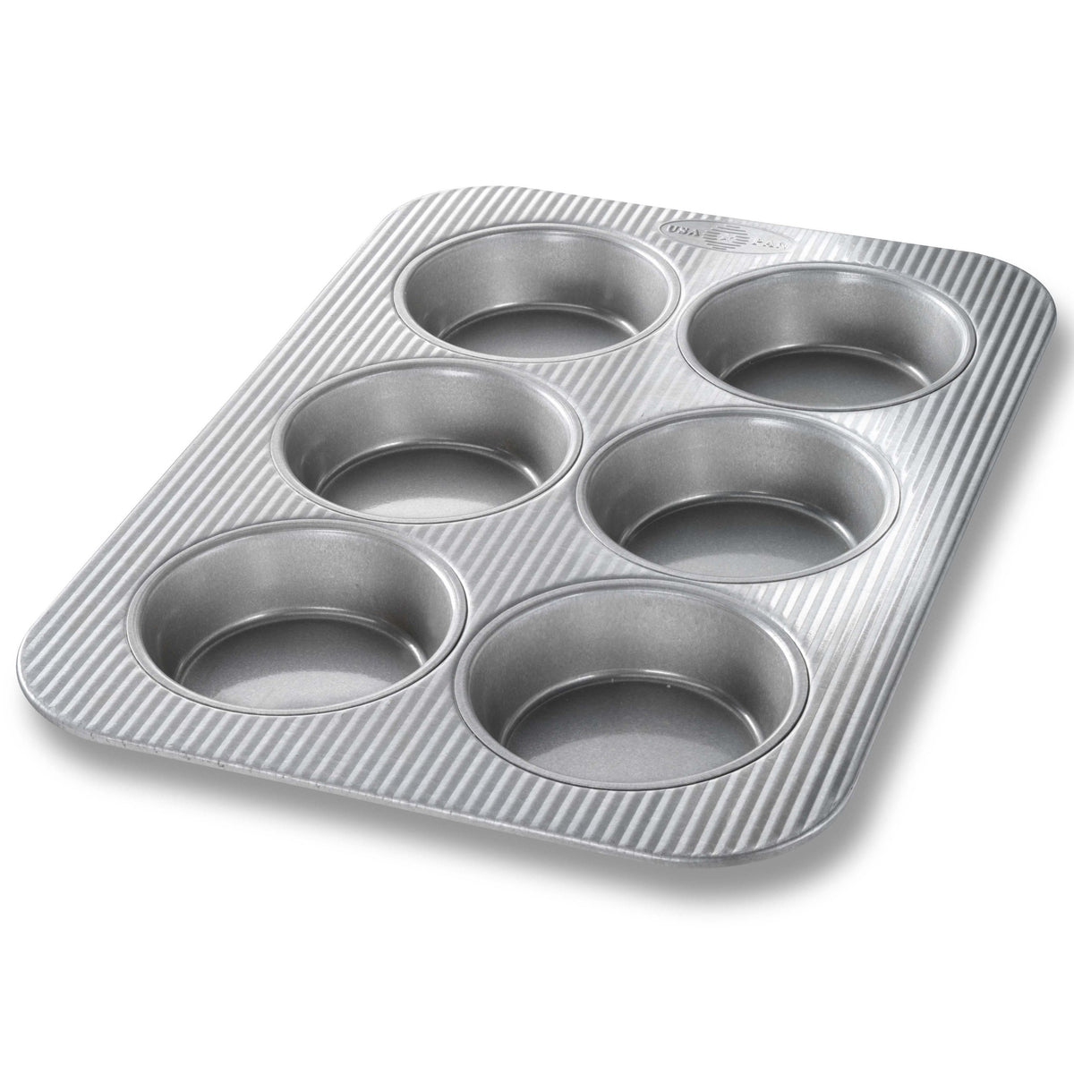 USA Pan mini round cake pan top view showing six wells for mini cakes